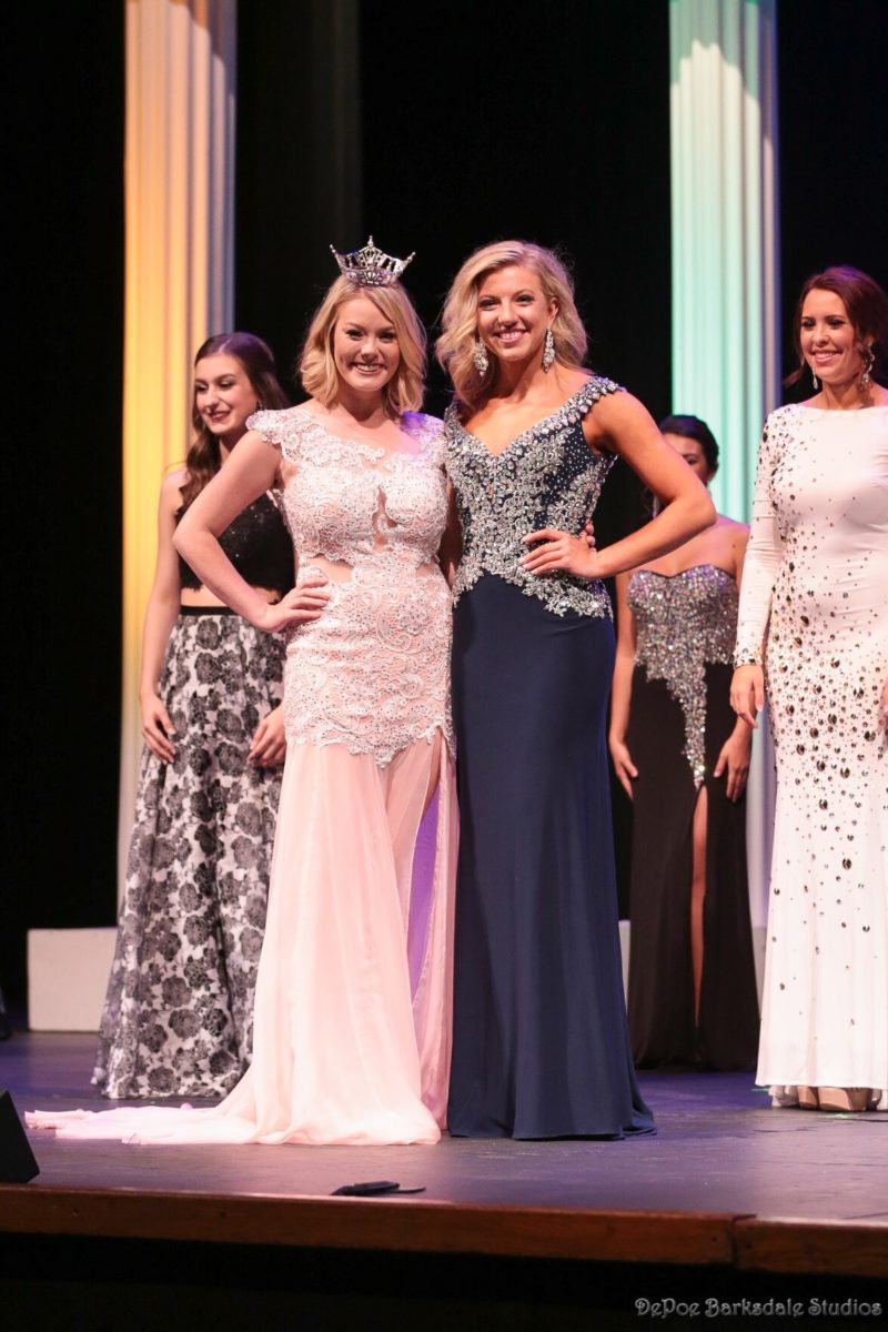 Beauty pageant winner and contestant pose in stunning gowns